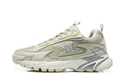 Side profile of a beige and grey Louis Vuitton sneaker with mesh panels and a sculpted sole.