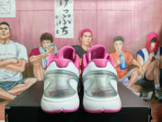 Rear view showing the white and translucent heel sections, pink collar lining, and LeBron signature details.