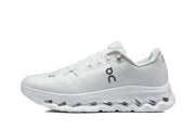 Side view of a white On Cloudmonster 3 shoe with black logo and sculpted outsole.