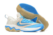 Blue and cream basketball shoe with bright blue accents