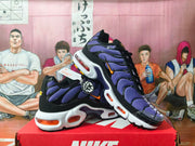 Nike Air Max Plus sneakers shown at an angle, highlighting the side and visible Air units