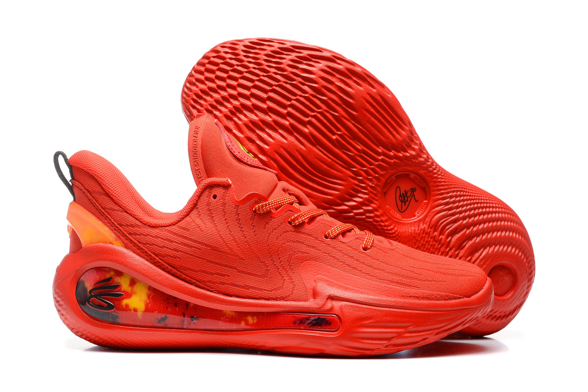 Pair of red basketball sneakers showing the textured outsole and translucent patterned side panel.