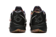 Rear view of gray Nike KD 4 shoes with colorful collars and patterned outsole details.