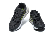 Pair of black Nike Air Max Verse sneakers viewed from above, with volt-green accents and white midsoles.
