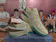 Angled view of two Nike basketball sneakers showing the perforated forefoot, mesh upper, Swoosh branding, and teal outsole details.