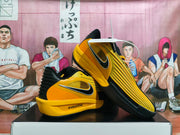 Pair of yellow and black Nike ZoomX sneakers shown from a side and sole angle.