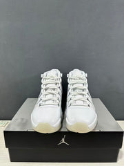 Front view of the pair of white high-top sneakers with white laces and rounded toe boxes.