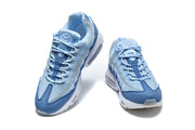 Pair of blue Nike Air Max 95 sneakers viewed from the front.