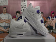 Angled view showing the white upper, mesh side panel, purple lace eyelets, and visible air window