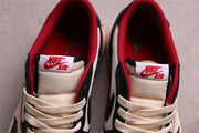 Top view showing red padded collars, cream laces, and tongue labels with Air branding.