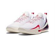 White basketball shoes with red accents and a visible Curry logo.