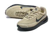 Pair of tan Nike Air Max sneakers viewed from above at an angle.