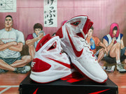 Pair of white and red Nike Hyperdunk high-top basketball shoes shown from an angled side view.