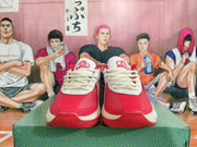 Front view of white and red Anta KT 10 basketball shoes with pale laces