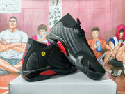 Angled view of the pair highlighting the perforated side panels, red accents, and structured sole.