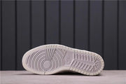 Outsole view showing the circular forefoot and segmented traction pattern.