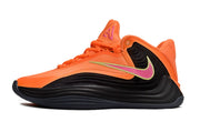 Side profile of an orange and black Nike Giannis Immortality 7 basketball shoe