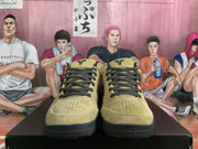 Front view of olive basketball sneakers with black laces, perforated toes and visible Nike branding.