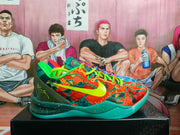 Side profile of the orange, green, and teal shoe with a bright Swoosh and patterned upper.
