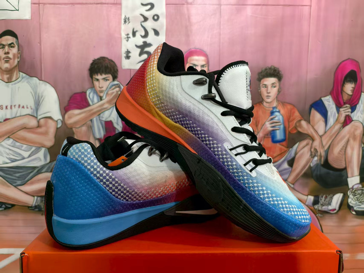 Pair of Nike basketball sneakers displayed at an angle, showing mismatched blue and multicolor uppers with black outsoles.
