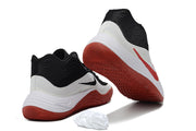 Black, white and red Nike Precision 8 shoes shown from the rear and outsole.