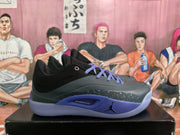 Side view showing the black upper, purple midsole accents, translucent outsole, and visible Air Zoom text.