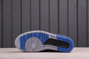 Outsole view showing blue and light gray traction sections with circular and linear tread patterns.
