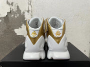 Rear view of white and metallic-gold Nike Zoom 2K5 basketball shoes.