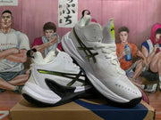 Angled view of white ASICS METARISE shoes with black side detailing and yellow-green accents.
