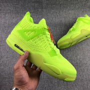 Angled view showing the fluorescent green upper, lace cage and sculpted side panels.