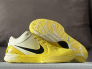 Side view with the outsole lifted, showing the geometric traction pattern and “ZOOM AIR” midsole lettering.
