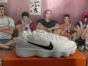 Side view of a white sneaker with a black Nike Swoosh, white laces, and a layered outsole.