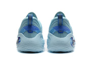 Rear view of the light blue sneakers showing blue pull tabs, translucent heel elements, and Curry branding.