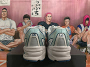 Rear view of white and blue New Balance sneakers
