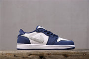 Side profile showing the white side panel, contrasting Swoosh, navy overlays, and white midsole.