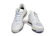 Front view of a pair of white Nike Pegasus Premium running shoes.