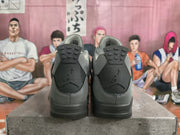 Rear view of the gray and black sneaker pair, showing the dark heel panels and visible Jumpman logos.