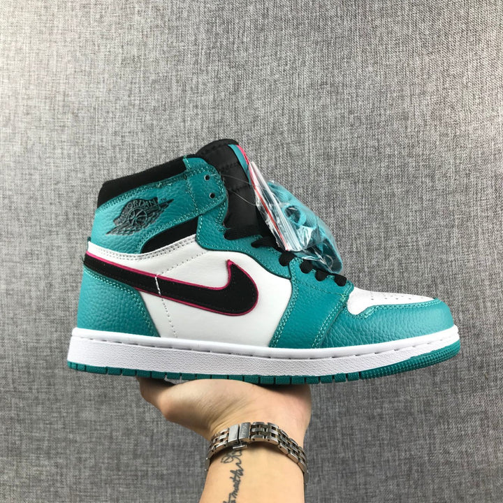 Side view of a teal, white, and black Air Jordan 1 high-top with pink-edged black side accents.