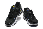 Front and top views of a pair of black Nike Air Max Plus TN sneakers.