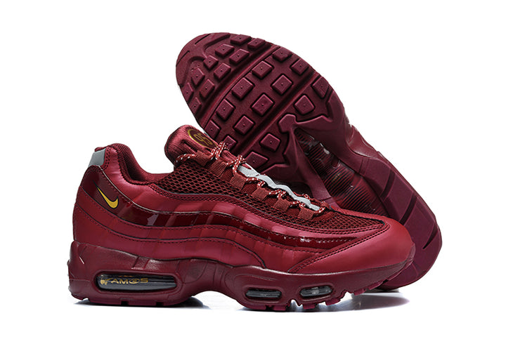 Burgundy Nike Air Max 95 TT sneakers shown from the side and with the outsole visible