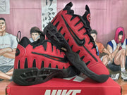 Red and black Nike sneakers shown from the side and at an angle