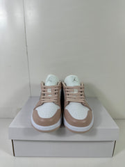 Front view of the pair showing light bone laces, white perforated toe boxes, and tongue branding.