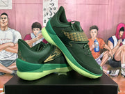 Angled display of a pair of green sneakers highlighting the patterned overlays, lace-up design, and contrasting lime-green soles.