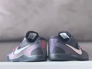 Rear view of two Kobe 11 shoes showing contrasting heel details and side Swooshes.