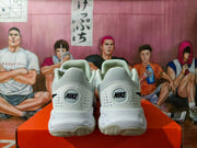 Rear view of the Nike shoes with logo patches on the heels.