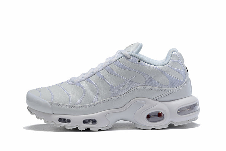 White Nike Air Max Plus-style sneaker shown from the side.