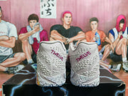 Rear view of light pink basketball shoes with textured heels
