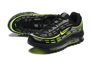 Pair of black Nike Air Max sneakers with bright volt accents, shown from above and at an angle