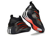 Black and red Adidas Harden Vol. 9 sneakers shown from the heel and outsole angles.