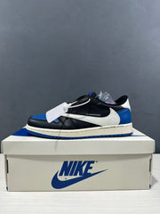 Side profile of the sneaker with black panels, white Swoosh, blue heel, and blue outsole.